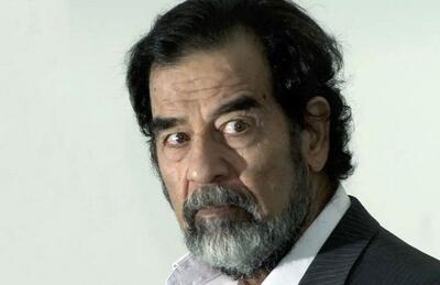  «صدام حسین» در حال بازدید از یک خانواده کشاورز در موصل