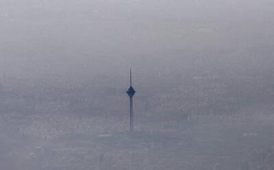  عکس/ برج میلاد ایستاده در غبار