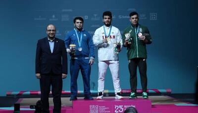  حضور دبیرکل کمیته ملی المپیک در مراسم توزیع مدال وزنه‌برداری مردان
