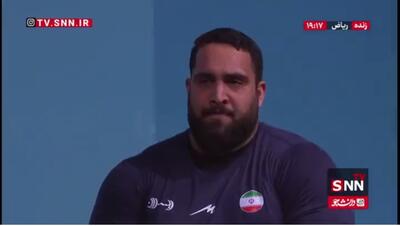  حسن پور، ملی پوش وزنه برداری ایران در دسته فوق سنگین حضور پیدا کرد و با ذکر یاعلی وارد تخته رقابت شد