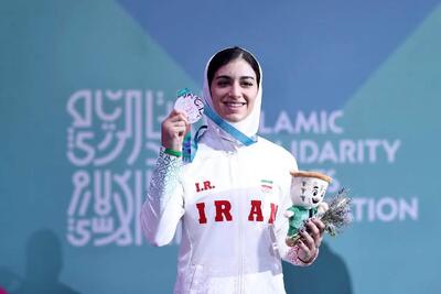  گزارش تصویری از مراسم اهدای مدال نقره به زهرا اکبری