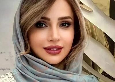  عکس زیرخاکی از کودکی شبنم قلی خانی در آغوش پدرش