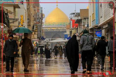  نمایی زیبا از بارش باران در حرم مطهر امیرالمومنین علی (ع)