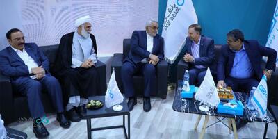  دیدار علاءالدین بروجردی با برات کریمی در غرفه بانک دی | اقتصاد24