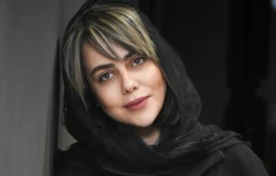  تیپ شیک الهام اخوان با بارانی و کیف برند چند میلیونی