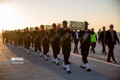  پیکر مطهر ۷ شهید گمنام دوران دفاع مقدس وارد کرمانشاه شد+فیلم