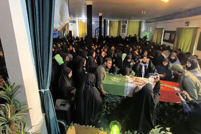  ورود پیکر مطهر شهید گمنام به مدرسه شاهد نصرت در مشهد