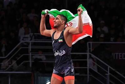  دور افتخار رحمان عموزاد با پرچم ایران پس از قهرمانی (فیلم)