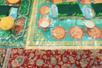  مراسم معنوی بسته بندی نبات و نمک متبرک توسط خادمان رضوی
