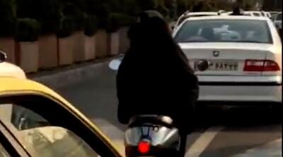  ویدیوی متفاوت موتورسواری یک زن با چادر در تهران
