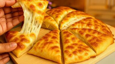  «طرز تهیه نان پنیری خانگی خوش طعم با موزارلا و تخم مرغ»