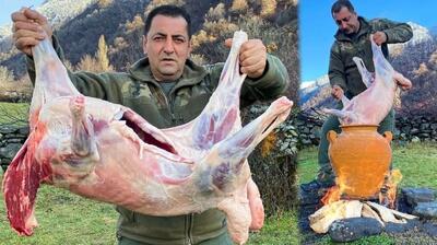  آشپزی روستایی در آذربایجان؛ پخت یک غذای خاص با گوشت بره در کوزه (فیلم)