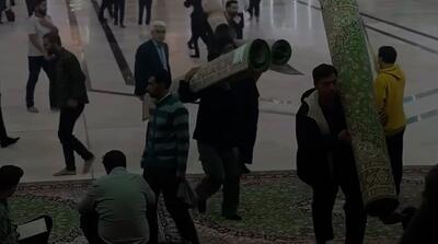  لحظه جمع آوری فرش‌های مالک آینده از حرم امام حسین