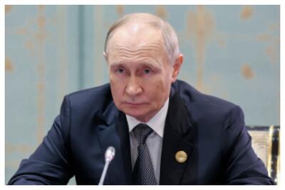  استایل جالب ولادیمیر پوتین در دیدار با چارلز؛ 30 سال پیش+عکس