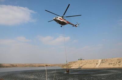  سورت پروازی بالگرد هلال احمر در مهار آتش سوزی جنگل توسکستان