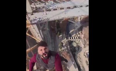  حرکت تازه بلاگر «وضعتان چونه؟» جنجالی شد+ ویدئو | راه رفتن روی لبه باریک جرثقیل بدون تجهیزات ایمنی!