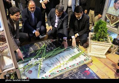  ادای احترام وزیر ارتباطات به مقام شامخ شهید سلیمانی - تسنیم