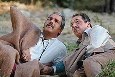  نگاه روز | تصویری کمتر دیده شده از مهران مدیری و نگار پیل آرام در پشت صحنه سریال شب‌های برره در سال 84 🌟