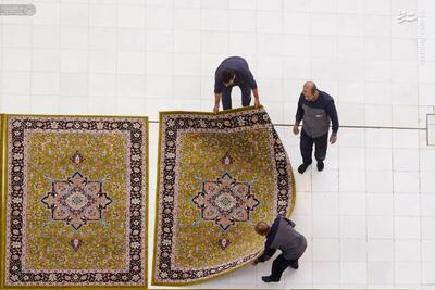  عکس/ مفروش شدن صحن ‌مطهر علوی با فرش ایرانی