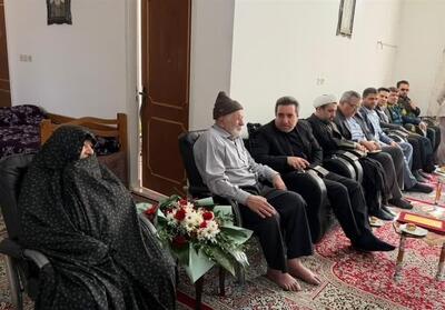  دیدار رئیس سازمان ثبت اسناد با خانواده شهیدان دهقانی در تفت - تسنیم
