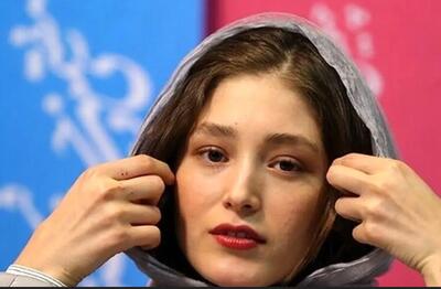  عکس زیرخاکی از کودکی فرشته حسینی در آغوش مادرش