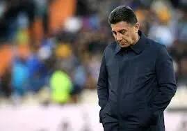 امیر قلعه‌نویی در کنار سرمربی قهرمان اروپا