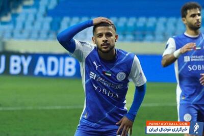 تصویری از مهدی قایدی در کنار پسرش