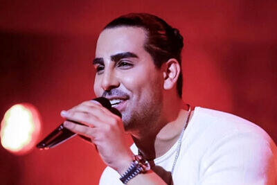 حمله یک هوادار به مجید رضوی حین اجرای کنسرت