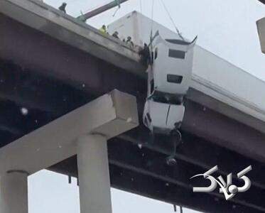 لحظه دلهره آور نجات راننده تریلی معلق را ببینید - مجله اینترنتی کولاک