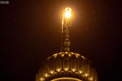  تصاویر زیبا از بارش باران در حرم امام علی(ع)