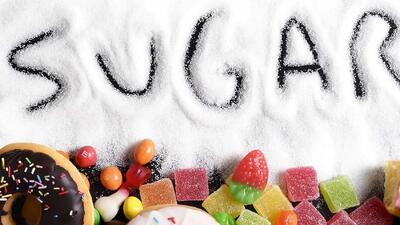 ۸ علامت که نشان می دهد بیش از حد شکر مصرف می کنید