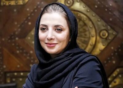 عکس نوزادی رویا میرعلمی در آغوش پدرش