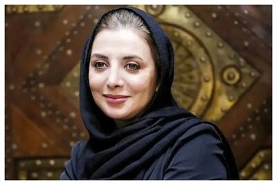 نوزادی رویا میرعلمی در آغوش پدرش