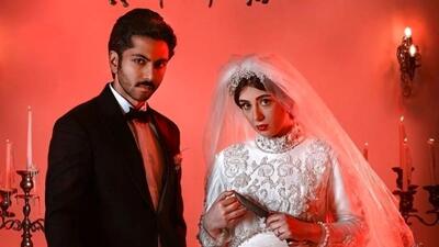  عکس ها / نگاهی به چیدمان عروس پسند خانه  کیسان دیباج با شومینه اعیانی/ مبلمان شیک و مدرن با ترکیب چوب بلوط و مخمل تابلو های زمان قاجار و...