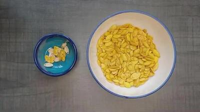  تخمه کدوی دو آتیشه رو با طعم دلخواه روی اجاق گاز درست کن !