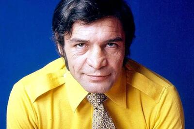 (عکس) بیک ایمانوردی در حال تمرین با هالتر در خانه، دهه ۴۰