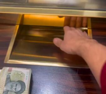  تحویل ۱۳۰میلیون ریال پول ملی برای گرفتن یک اسکناس ۱۰۰ دلاری + فیلم