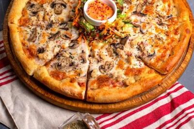  چرا پیتزای سرد باقی‌مانده در یخچال خوشمزه‌تر است؟