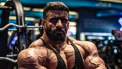  تغییر چهره غافلگیرکننده هادی چوپان؛ ژست خاص قهرمان جهان با کت و عینک کلاسیک (عکس)