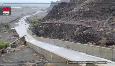 سرریز شدن سد بزرگ خاکی فاریاب/ رودان بعداز بارندگی