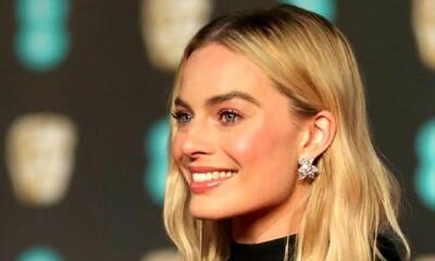  سفر در زمان؛ «مارگو رابی» در مراسم افتتاحیه فیلم گرگ وال استریت در لندن؛ سال 1392