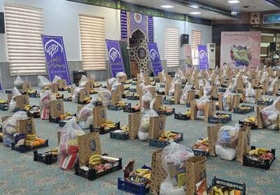 برگزاری رزمایش توزیع بسته‌های معیشتی ویژه یلدا در خراسان رضوی - تسنیم