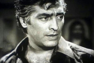  فردین در مغازه‌ فرش فروشی‌اش همراهِ پسرش و رضا صفایی‌پور