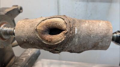  تبدیل کنده درخت به بطری آب با جلوه طرح چشم اژدها!