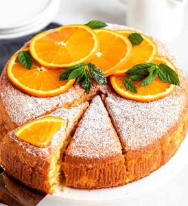  طرز تهیه کیک پرتقالی همراه با سس پرتقال