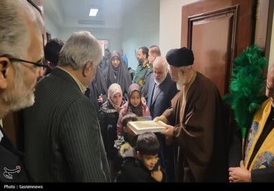 آیین بدرقه خانواده شهدای جنگ 12 روزه شهرری به مشهد مقدس - تسنیم