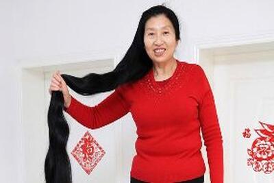 زنی که ۱۴ سال موی خود را کوتاه نکرده است+‌تصویر