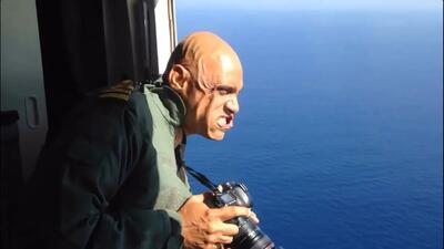 تصاویر خارق‌ العاده از طوفان؛ چالش عکاسی حین باز شدن درِ هواپیما / فیلم