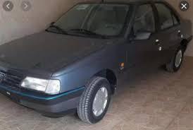 مزایده یک دستگاه  پژو 405 مدل 90  موتورسکیلت بنلی مدل 1401 مشکی