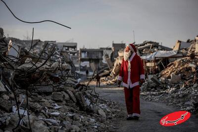  بابانوئل در میان کودکان غزه + تصاویر - کلبه سرگرمی